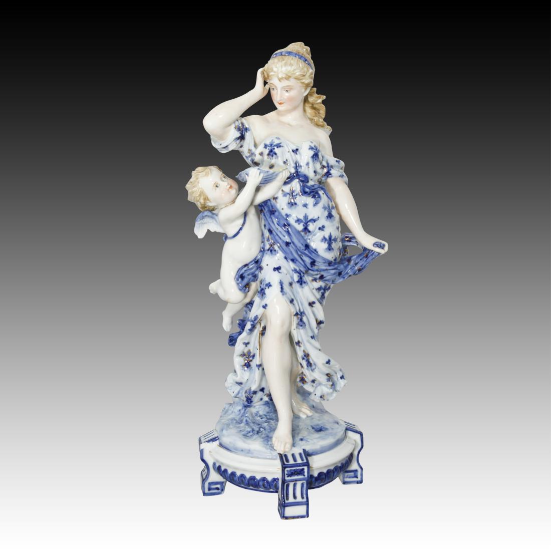 KPM Rubenesque Woman with Cherub Figurine 1049: KPM Rubenesque Woman with Cherub Figurine 1049 KPM Rubenesque Woman with Cherub Figurine wearing a blue and gold dress off the shoulders Designer: R. Moller Origin: Germany Size: 16.0" H Issued: 20th