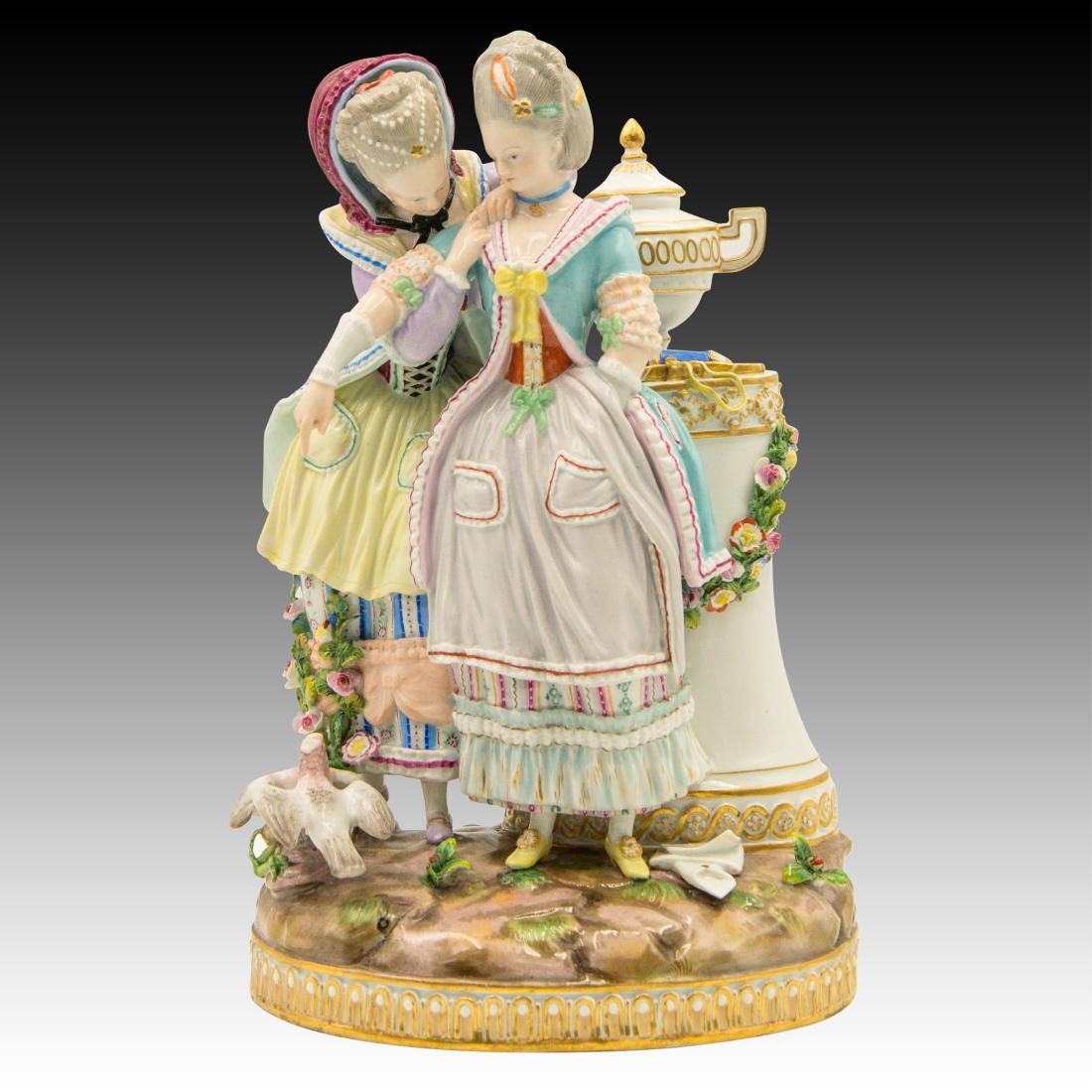 Meissen Figurine with 2 Women with Birds and Urn: Meissen Figurine with 2 Women with Birds and Urn Very brightly colored figurine of two Women holding each other looking at Love Birds at their feet. A pedestal with a Gold Gilt Urn along with Bow and 