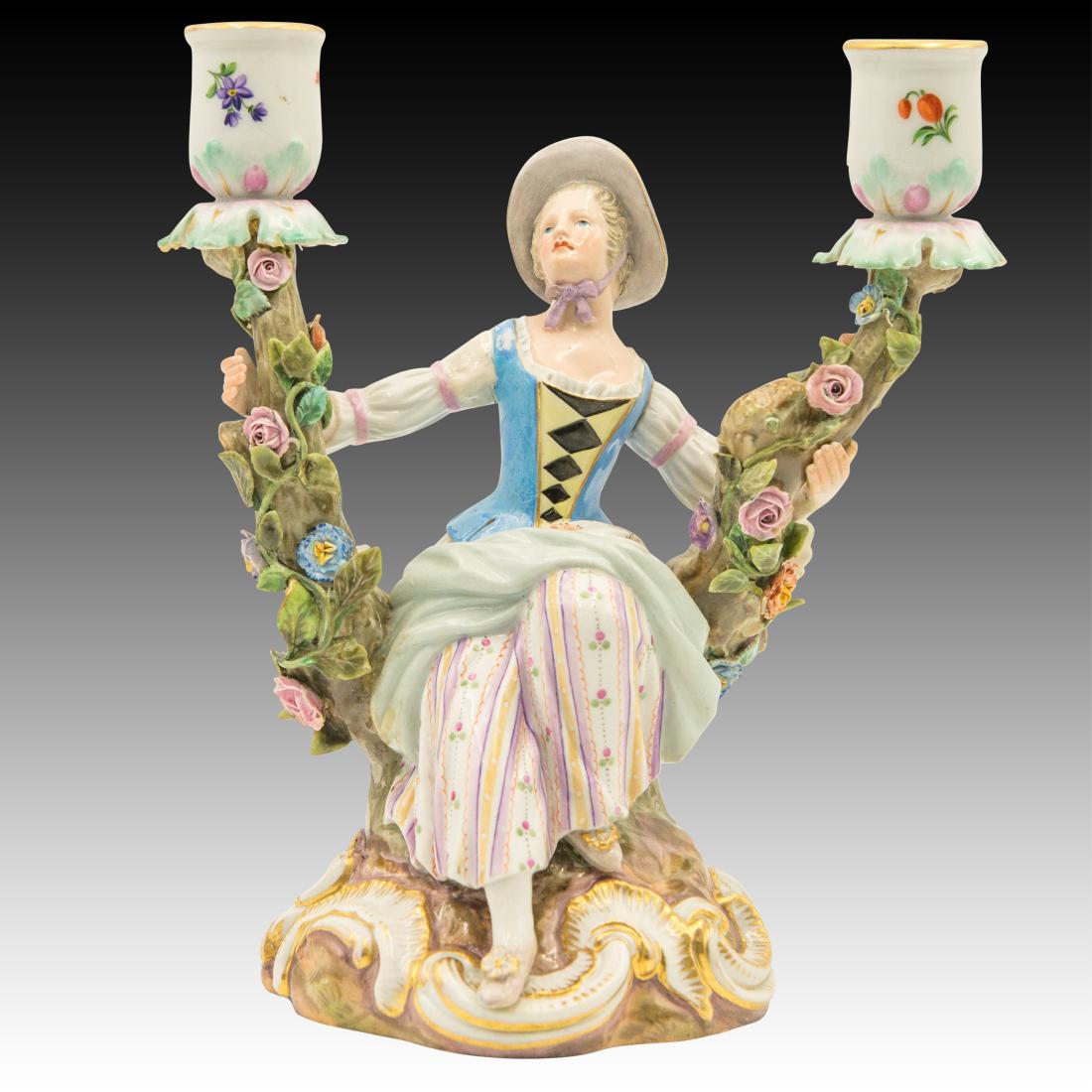 Meissen Young Woman Double Candle Holder: Meissen Young Woman Double Candle Holder Meissen Young Woman double candleholder with crossed swords mark. Model # 1180 S. Origin: Germany Size: 8.0"H x 7.75"W Issued: 20th Century