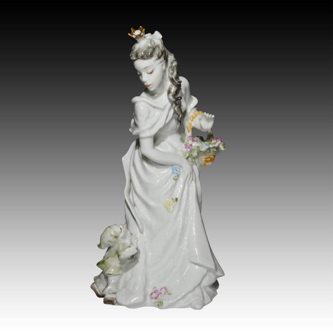 Rosenthal Figurine of Snow White with a Dwarf: Rosenthal Figurine of Snow White with a Dwarf Rosenthal figurine of Snow White and one of the 7 Dwarfs. She has a basket of flowers under her left arm and wears a golden crown on her head. # 5145/1. O