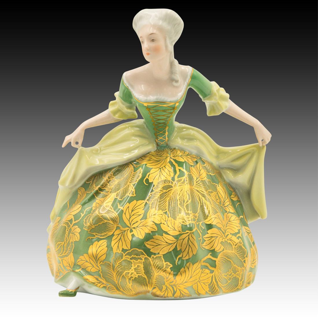 Rosenthal Rococo Dancer in Gold Green Dress: Rosenthal Rococo Dancer in Gold Green Dress Rosenthal Rococo Dancer wearing gold flower and leaf patterned green dress Model # 6400. Origin: Germany Size: 7.0"H Issued: 20th Century