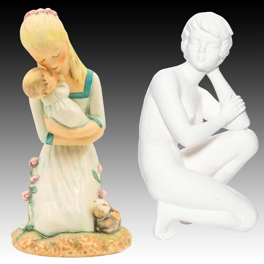 Pair of Goebel Female Nude Figurines: Charlotte Byj figurine of a young Blonde Woman wearing a flower crown, hugging her child closely with a rabbit at her left side and flowers on the right. Trademark 5 or made from 1972 - 1979. 8.5" You