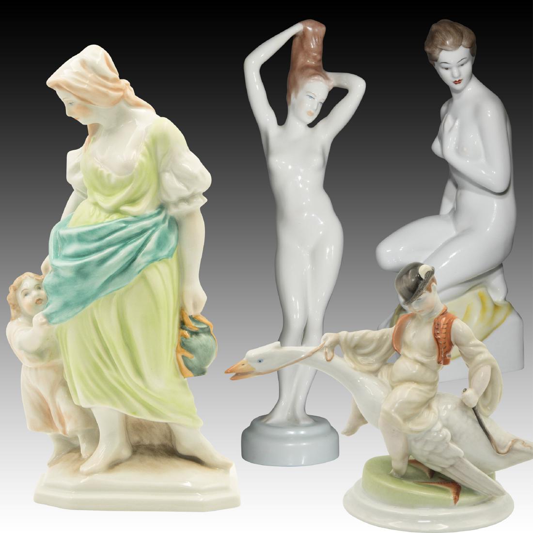 Group of 4 Figurines Herend, Aquincum, Hollohaza: Group of 4 Hungarian Porcelain Figurines: 1) Herend figurine of a Boy wearing orange vest riding a goose. Stamped and incised Herend with # 5515/2 20th century mark. Hungary Good overall condition 8.0