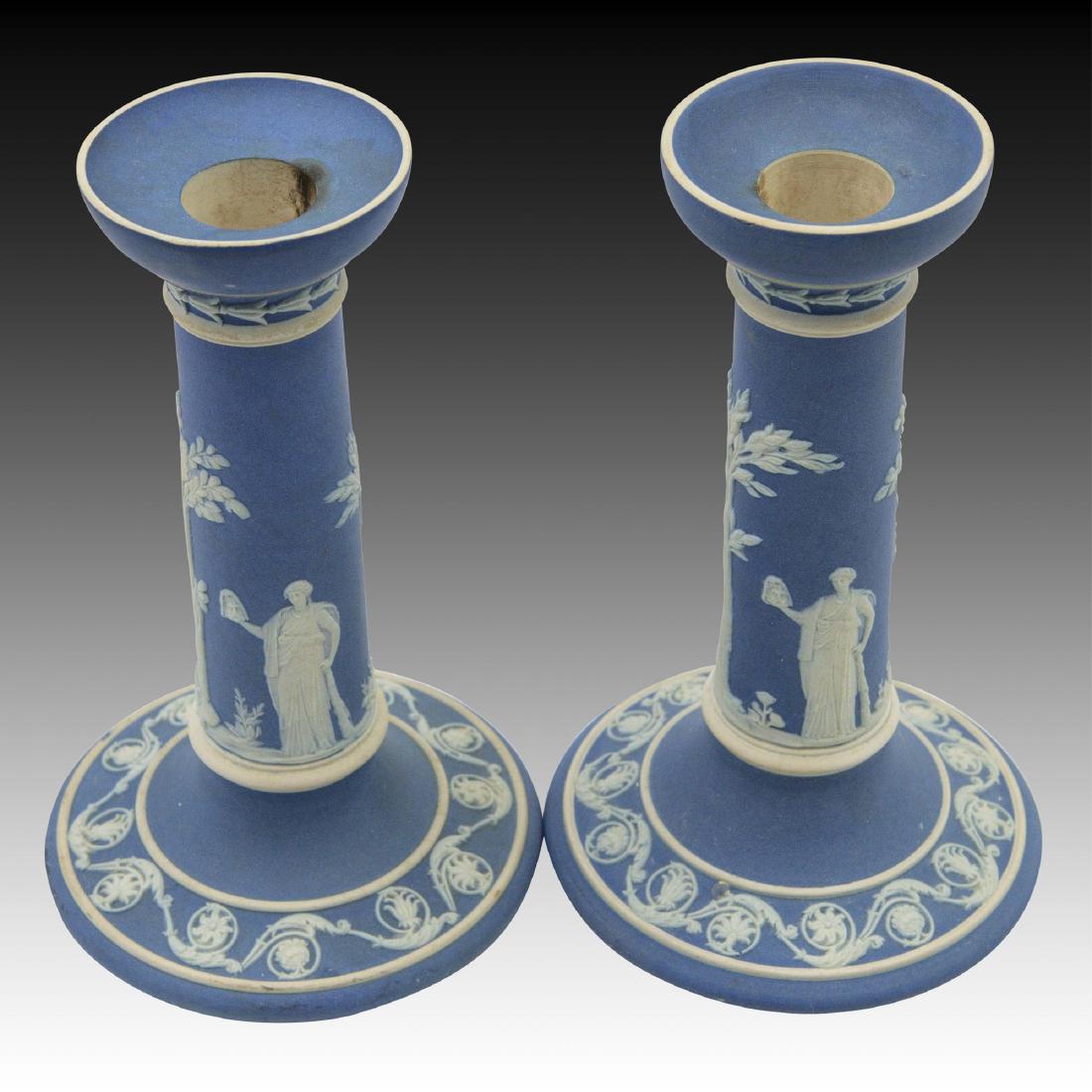 Pair of Royal Blue Wedgwood Jasperware: Candlesticks These 7" tall candlesticks are truly beautiful and would add well to any collection. Great detail. Marked Wedgwood England. ; Size: 7" H;