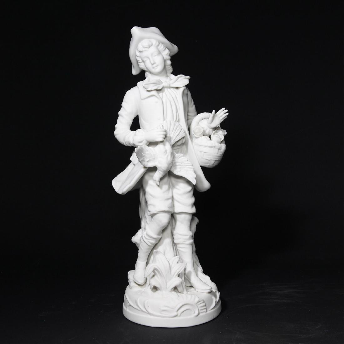 Bisque Porcelain Statue Sculptural Figurine: Bisque Porcelain Statue Sculptural Figurine of a colonial boy. Marked on the bottom =; Country of Origin: France; Size: 12"H x 4"D; Issued: circa mid 20th century
