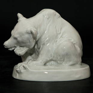 Meissen Blanc De Chine Porcelain Bear Figurine: Meissen Blanc De Chine Porcelain Figurine "Eating Bear" designed by August Gaul in 1895. Signed on the base. Marked on the bottom with blue crossed swords and impressed crossed swords above Weiss. Cir