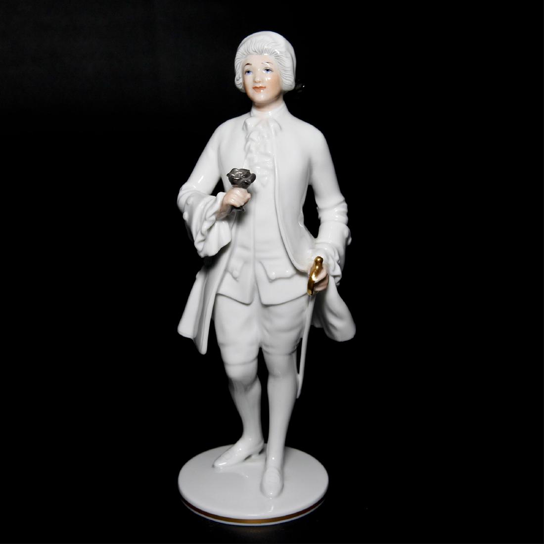 Augarten Wien Austria Porcelain Colonial Figurine: Augarten Wien Austria Porcelain Colonial Figurine "The Rose Bearer" ("Rosenkavalier") designed by Professor Albin Dobrich in 1924. Marked on the bottom. 8"H x 2.5"D Excellent condition =