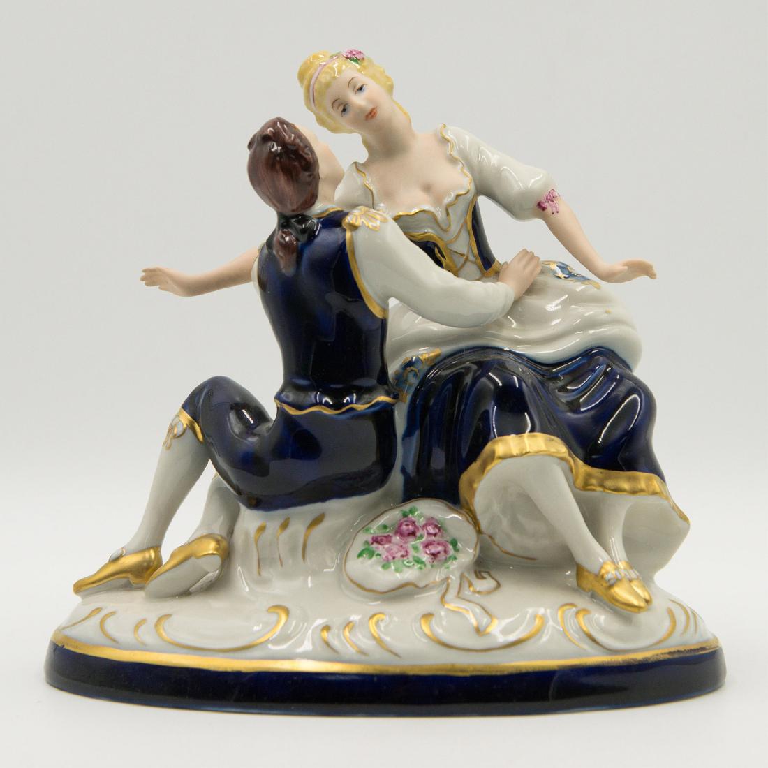 Royal Dux Porcelain Colonial Group Figurine: Royal Dux Czechoslovakia Porcelain Colonial Couple Group Figurine. Circa 1920s. marked on the bottom. 8"L x 7"H x 4.5"W =