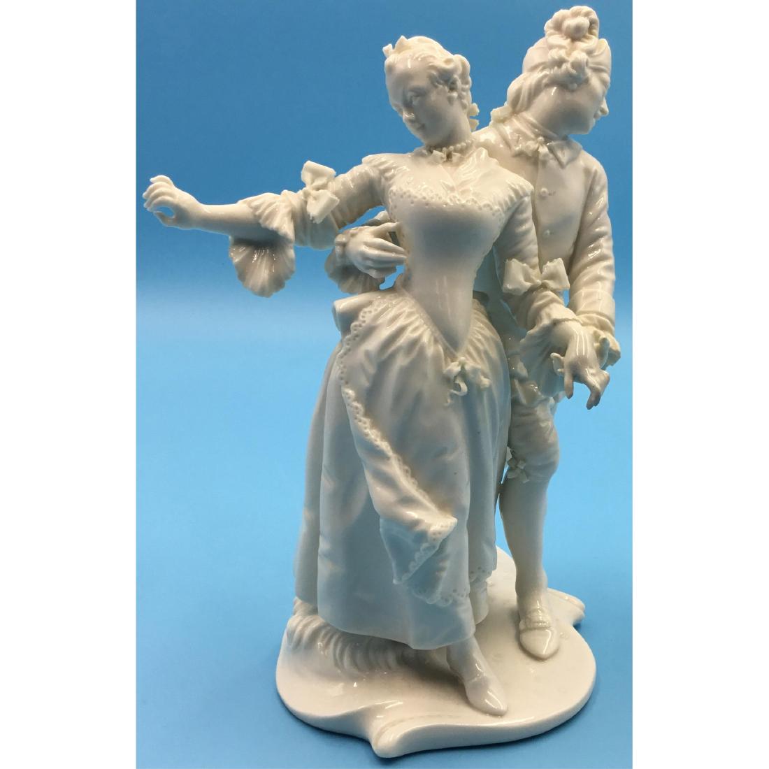 Nymphenburg Porcelain Figurine Couple: Nymphenburg Germany Blanc De Chune Porcelain Figurine of a Colonial Couple called Messenger and the Maid designed by Franz Anton Bustelli. Circa 1900s. ; Dimensions: 7"H x 4.5"L x 3.5"W;