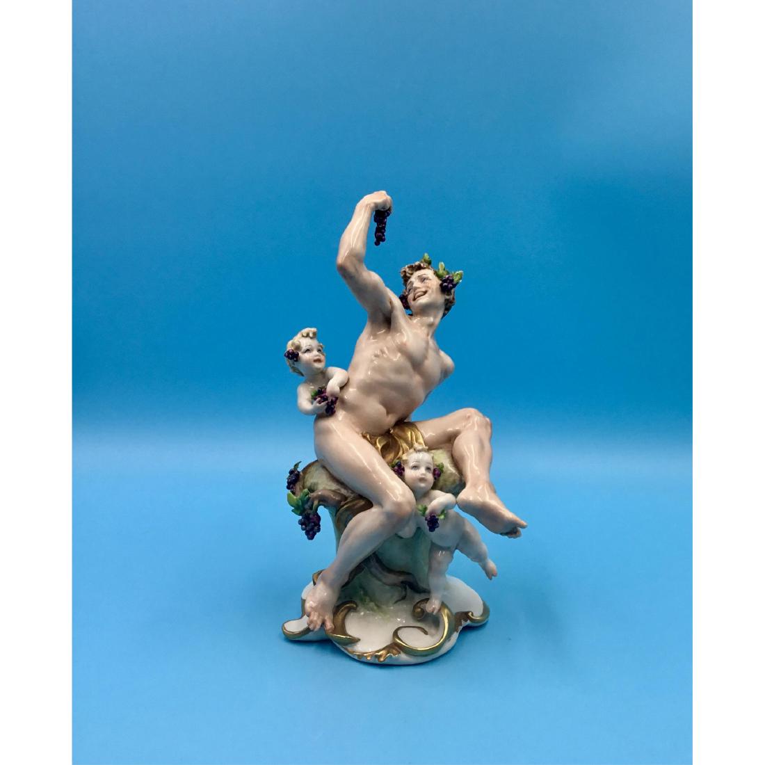 Capodimonte 1959 Giuseppe Cappe Figurine: Capodimonte Italy Giuseppe Cappe R.C. Porcelain Group Figurine of a semi nude man with cherubs and grape. Circa 1959. ; Dimensions: 8.5"H x 5"L x 4"W;