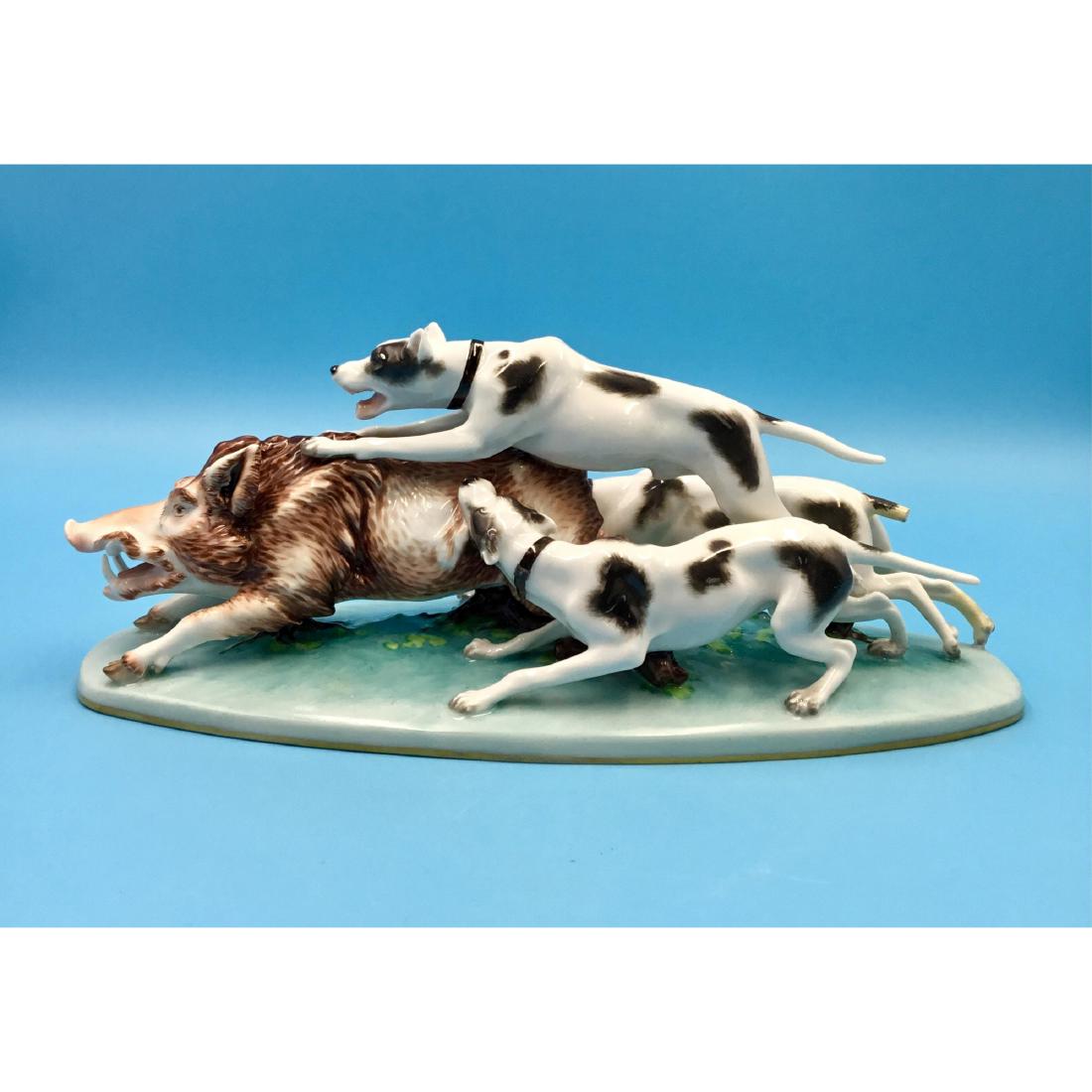 Augarten Wien Austria Porcelain Group Figurine: Augarten Wien Austria Porcelain Group Figurine Hunting Scene of dogs and a boar. Circa 1900s. ; Dimensions: 11"L x 4.5"H x 4.25"W;