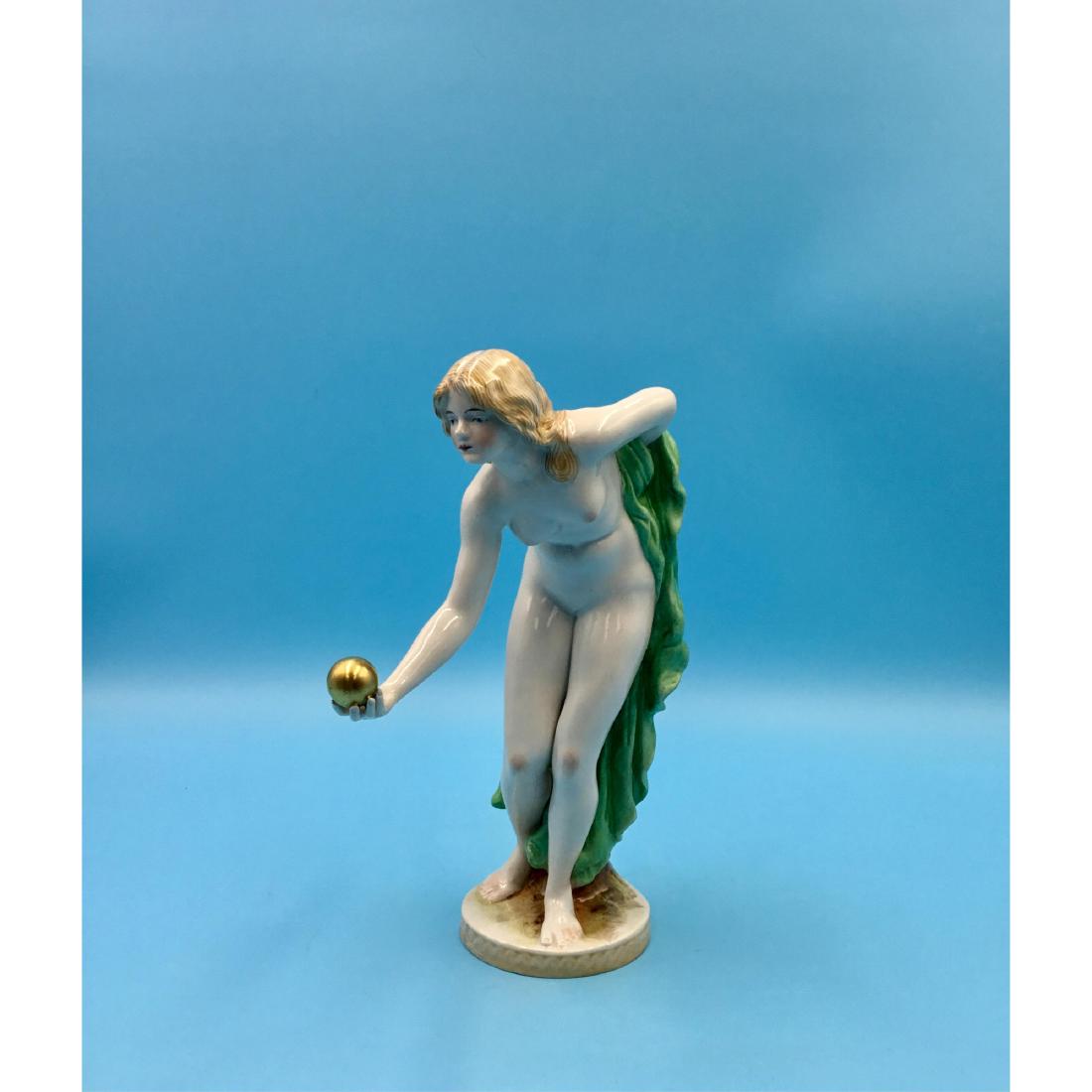 German Porcelain Nude Art Deco Figurine: Scheibe Alsbach Kister Germany Nude with a Golden Ball Art Deco Figurine designed by Walter Schott. Circa 1920s. ; Dimensions: 8"H x 5"L x 3"W;