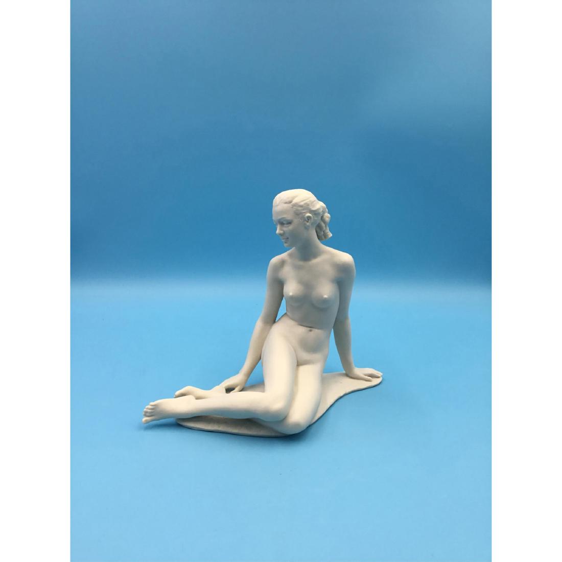 Hutschenreuther Nude Lady Porcelain Figurine: Hutschenreuther Germany Seated Nude Lady Porcelain Figurine designed by Hans Achtziger. Circa 1930s. Dimensions: 8"L x 6.5"H x 3.5"W