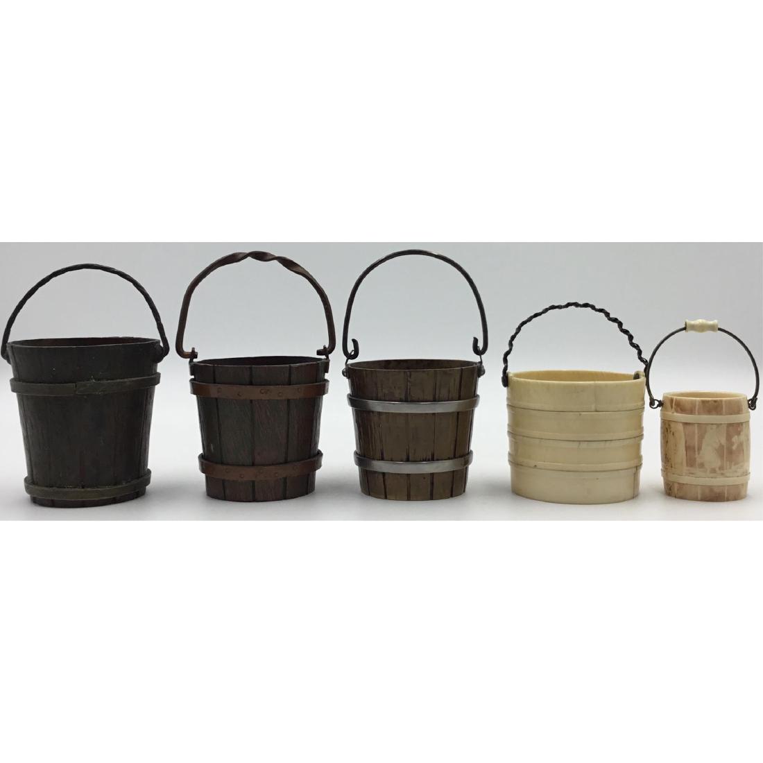 GROUP OF 5 ANTIQUE FRENCH MINIATURE BUCKETS: Group of 5 Antique French Miniature Buckets. 3 bronze ones and 2 bone. Tallest 2.75"H, smallest 1.75"H. Circa 19th century. ;