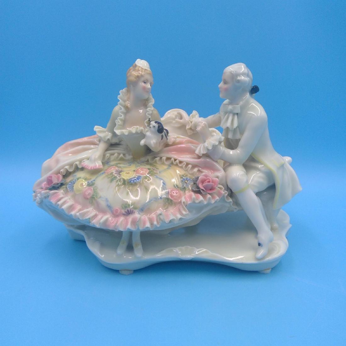 KARL ENS GERMAN PORCELAIN FIGURINE COURTING COUPLE: Karl Ens Group Figurine of a Courting Couple and a Dog. Circa 1920s. ; Country of Origin: Germany; Dimensions: 8"L x 5.5"H x 5"W;
