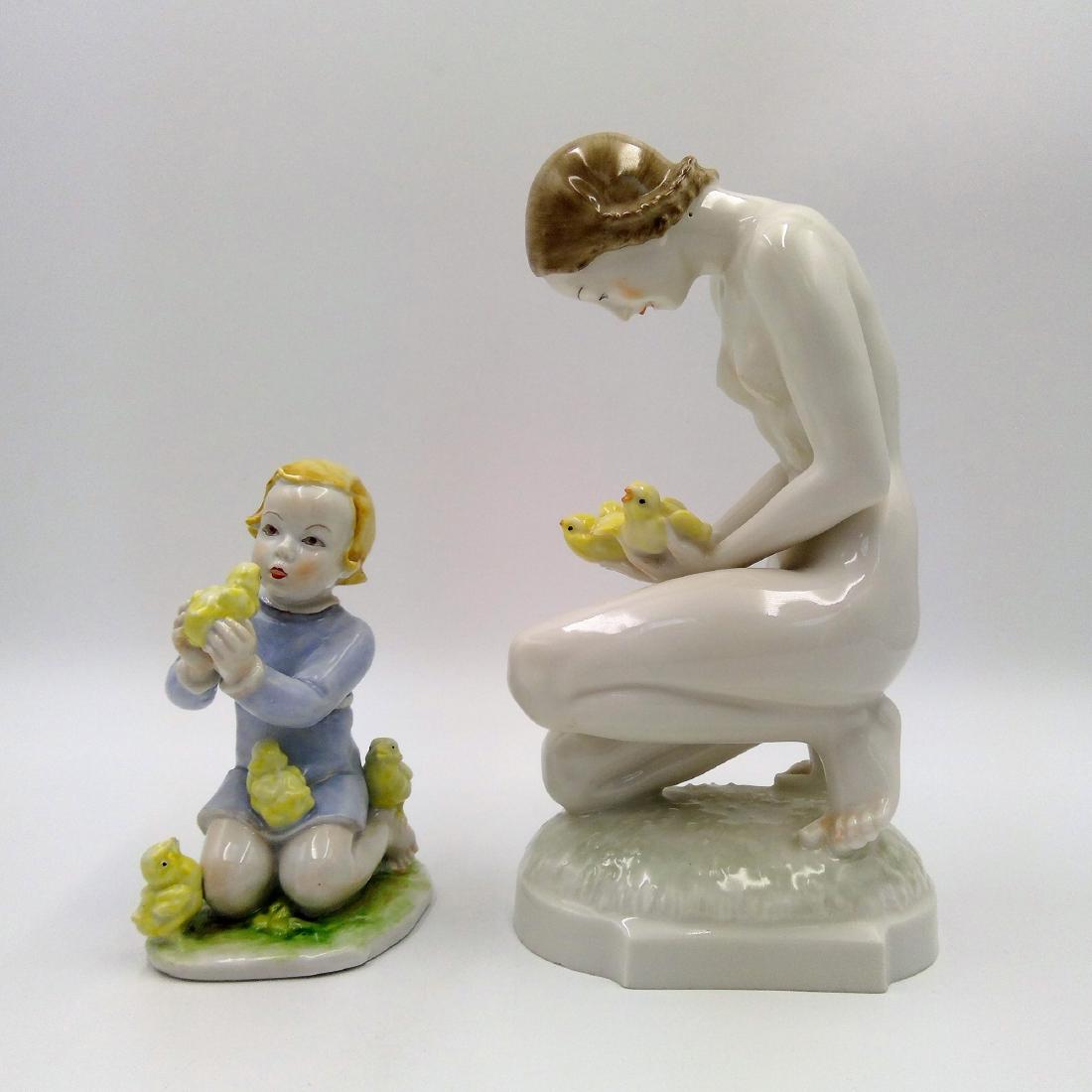 GROUP OF 2 ROSENTHAL & HUTSCHENREUTHER FIGURINES: A pair of Figurines: 1) Hutschenreuther Kunslabteilung Nude with Birds (8"H x 4.5"L x 3"W) designed by Carl Werner. Circa 1947. Marked US Zone. 2) Rosenthal "Kind Mit KÃ¼ken" (Child With Chicks) 5"H