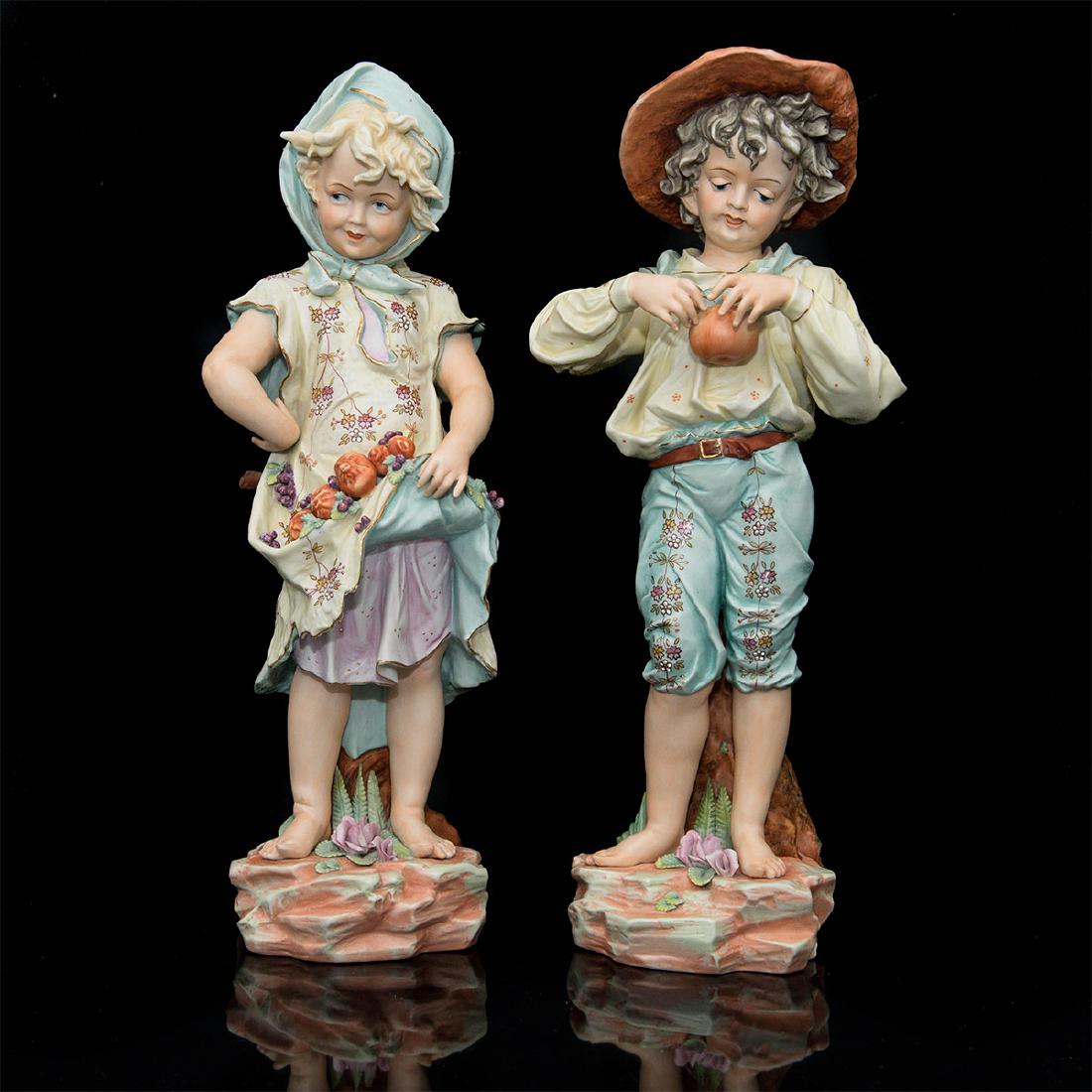 PAIR OF LARGE KPM GERMAN PORCELAIN FIGURINES: Group of 2 KPM Figures of a Boy and a Girl. Signed on the back, marked on the bottom. Circa mid 20th century.