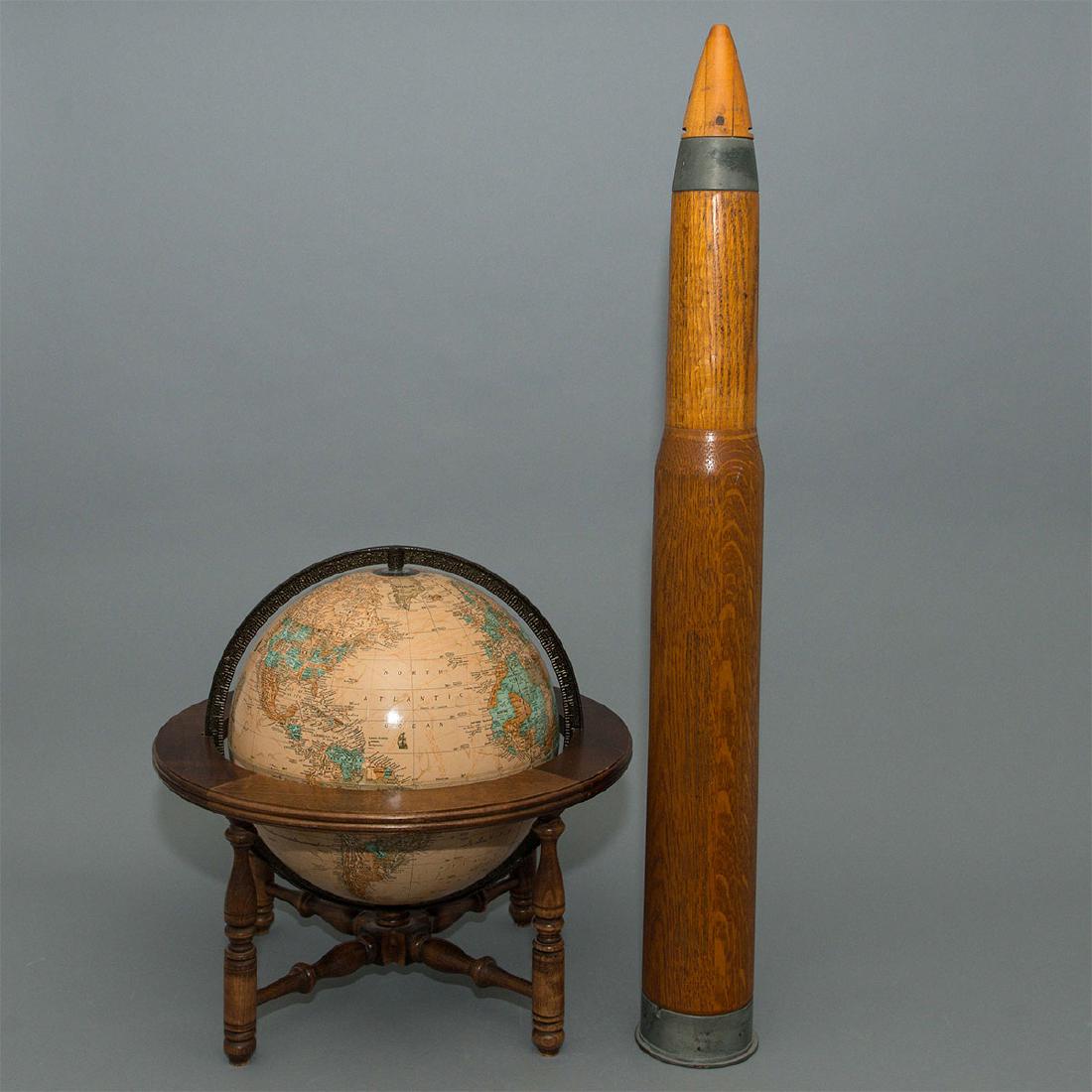 50 CALIBER NAVY WOODEN DUMMY ROUND: This is an original 23.5-pound vintage United States Navy inert dummy naval artillery round, used for training purposes during WWII. There are markings on the bottom metal part of the cartridge. On th