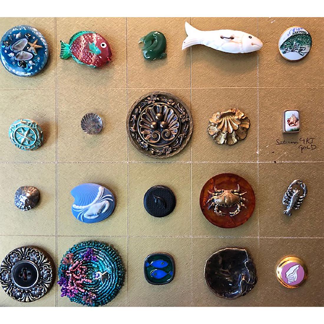 CARD OF 20 FISH AND SHELLS: Card of 20 Fish and Shells including Set in Gold, Bone, Jade,Bakelite, Celluloid and More.