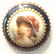 LARGE HAND PAINTED PORCELAIN LADY SET IN METAL