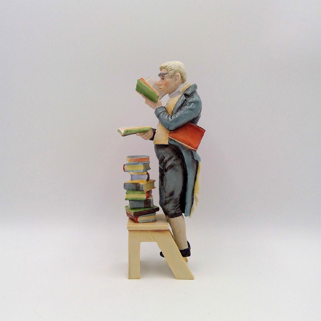 KAISER GERMAN PORCELAIN FIGURINE LIBRARIAN: AK Kaiser Figure of a Librarian / Bookworm. Circa 1967-1970. Model number 448. Artist: G. Bochmann; Country of Origin: Germany; Dimensions: 8"H x 3"L x 2"W;