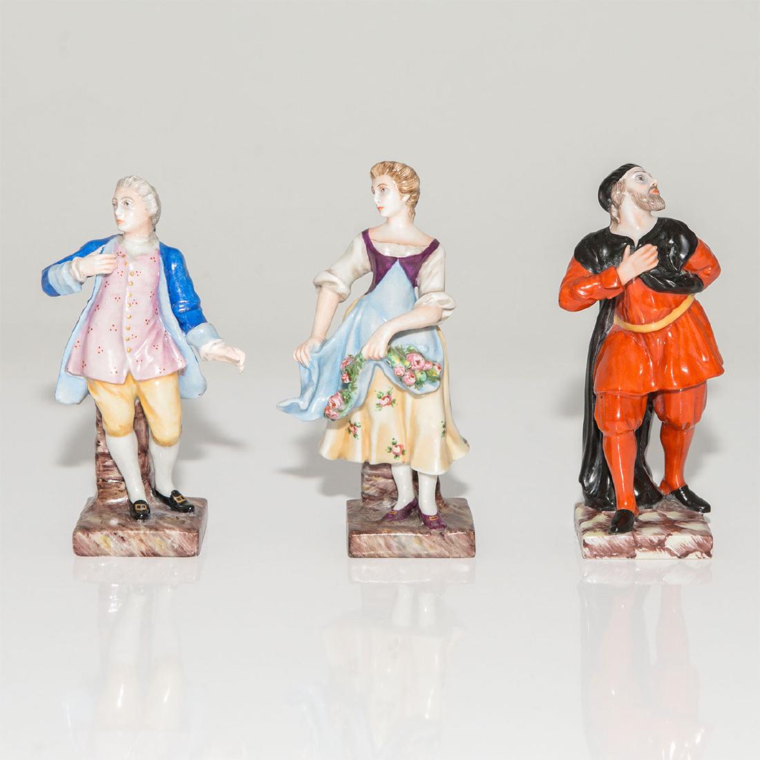 GROUP OF 3 ANTIQUE CAPODIMONTE FIGURINES: Group of 3 Capodimonte Porcelain Figurines depicting characters from Commedia Dell' Arte: Pantalone, Florindo and Corallina. Country of Origin: Italy; Dimensions: 5"H;