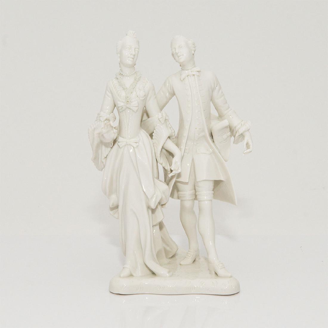 NYMPHENBURG GERMAN PORCELAIN GROUP FIGURINE: Nymphenburg Blanc de Chine Figurine of an Aristocratic Couple. Circa 1900s. Impressed number 13 / 0. Artist: Franz Anton Bustelli; Country of Origin: Germany; Dimensions: 7.5"H x 5"L x 4.5"W;