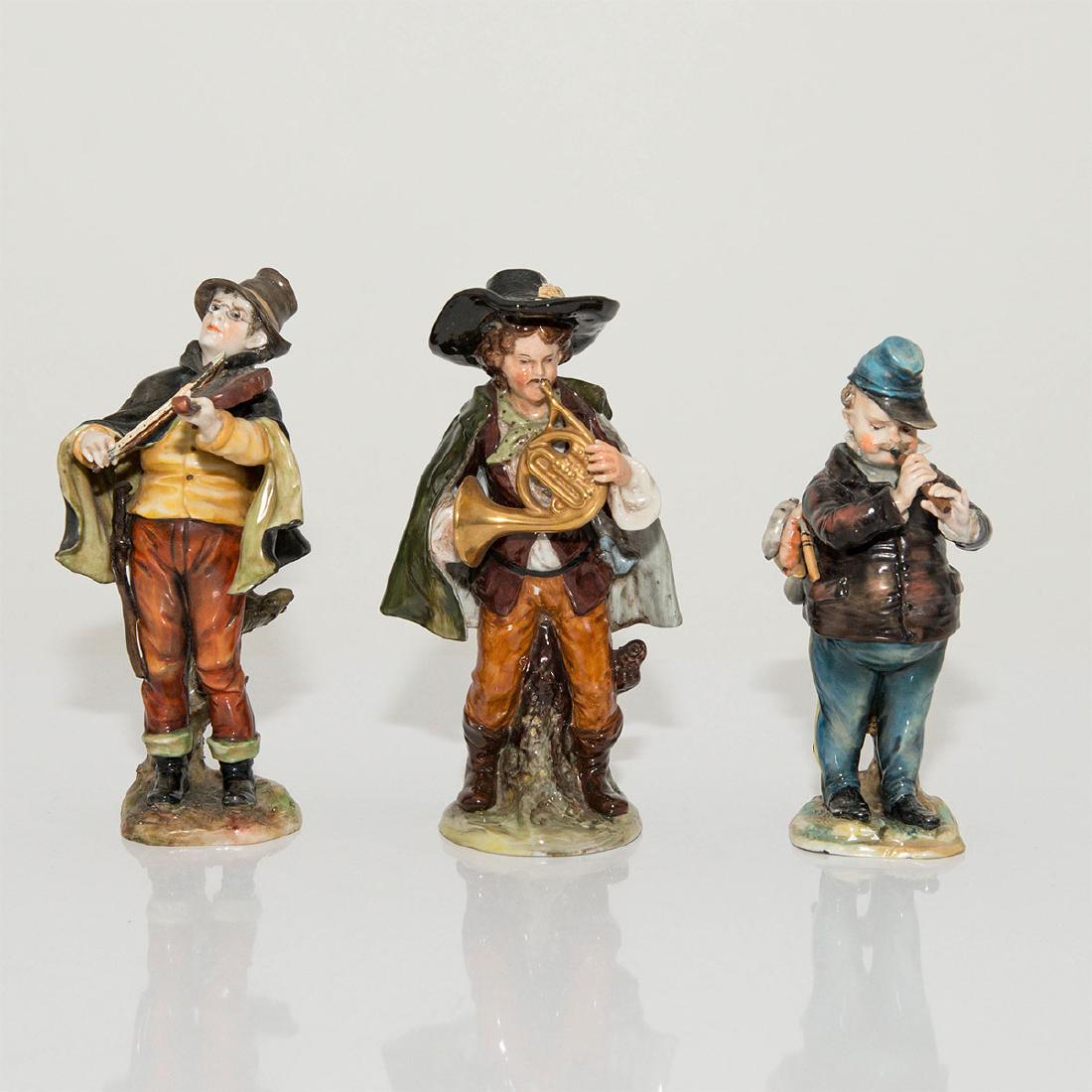 GROUP OF 3 ANTIQUE CAPODIMONTE FIGURINES MUSICIANS: Group of 3 Capodimonte Figurines of Musicians. Circa 1900s. Country of Origin: Italy; Dimensions: 6.5"H;