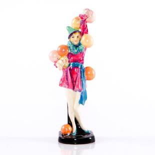 ROYAL DOULTON FOLLY HN1335 FIGURINE: A rare Royal Doulton figurine, FOLLY HN1335, designed by Leslie Harradine in 1929 and discontinued by 1938. Modeled as a mischievous clown, carrying balloons and wearing a cone hat, ruffled collar