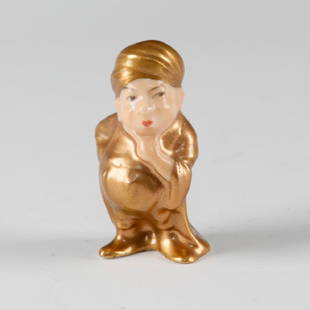 ONE OF THE FORTY GOLD HN423A MINIATURE FIGURE: Hand painted miniature figure dressed in gold with hands on hip and chin. Dimensions: 3"H x 2"W