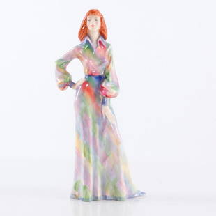 ROYAL DOULTON ABIGAIL PROTOTYPE FIGURINE: A rare Royal Doulton prototype figurine, ABIGAIL. Modelled as a young woman in a bright, multi-colored dress, standing with one hand on her hip. Exquisite detail in her green eyes, bright smile, and