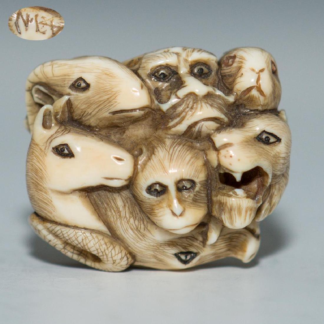 ANTIQUE JAPANESE CARVED BONE ZODIAC ANIMALS NETSUKE: Carving netsuke of zodiac animals. Depicts monkey, rabbit, horse, snake, rat, rooster, dog, ox, tiger, dragon, sheep and a pig. Dimensions: 1.25"L x 1.25"H x 1"W Country of Origin: Japan