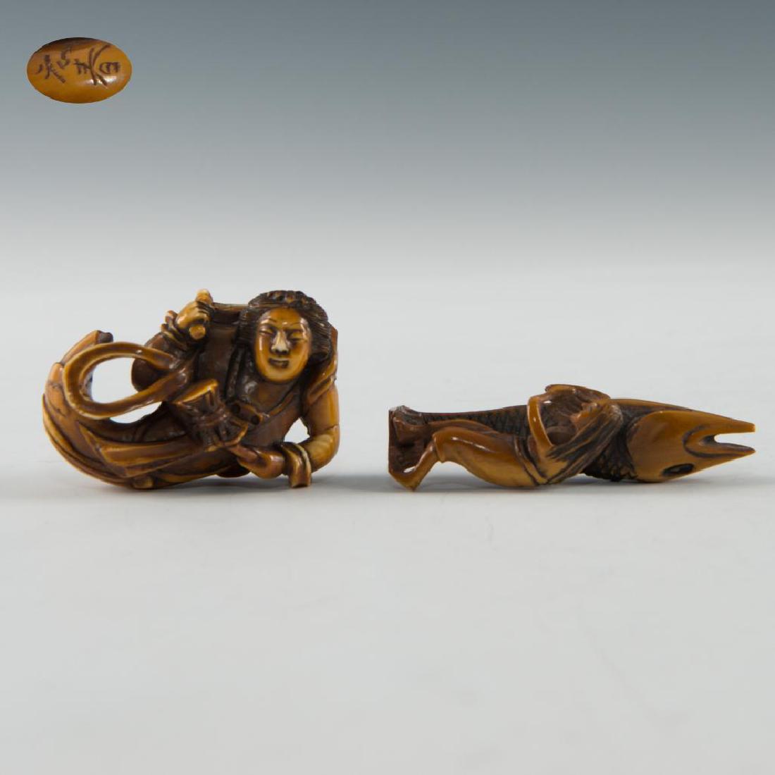 GROUP OF 2 ANTIQUE JAPANESE CARVED BONE NETSUKES: Set of 2 netsuke carvings. Woman with a giant fish (2.5"H), has a chip on right foot/fish's tail. Second figure (2"L) is signed on the bottom, has two chips on the back. Country of Origin: Japan