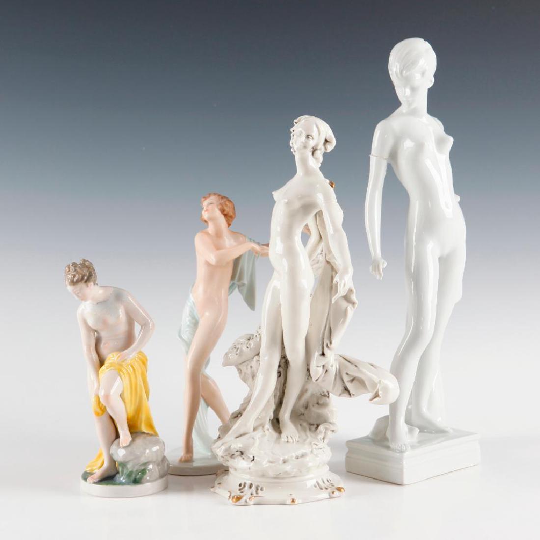 GROUP OF 4 ANTIQUE PORCELAIN FIGURINES NUDES: Group of 4 Nude Female Figures by various makers. 1) Rosenthal Art Deco Nude Dancer (7.75"H), called "Scherzo", designed by Gustav Oppel, circa 1920s. The pointy finger on left hand is chipped. 2) Wur