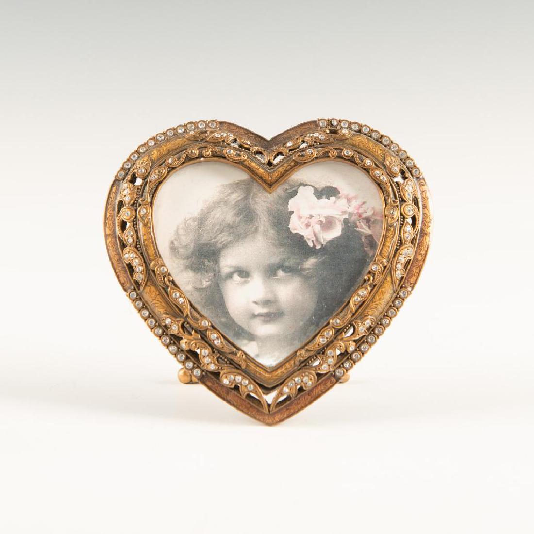 EDGAR BEREBI LIMITED EDITION JEWELED PICTURE FRAME: Heart shaped decorated with crystals and enamel. Marked on the back. Dimensions: 4"H x 4"W Country of Origin: USA
