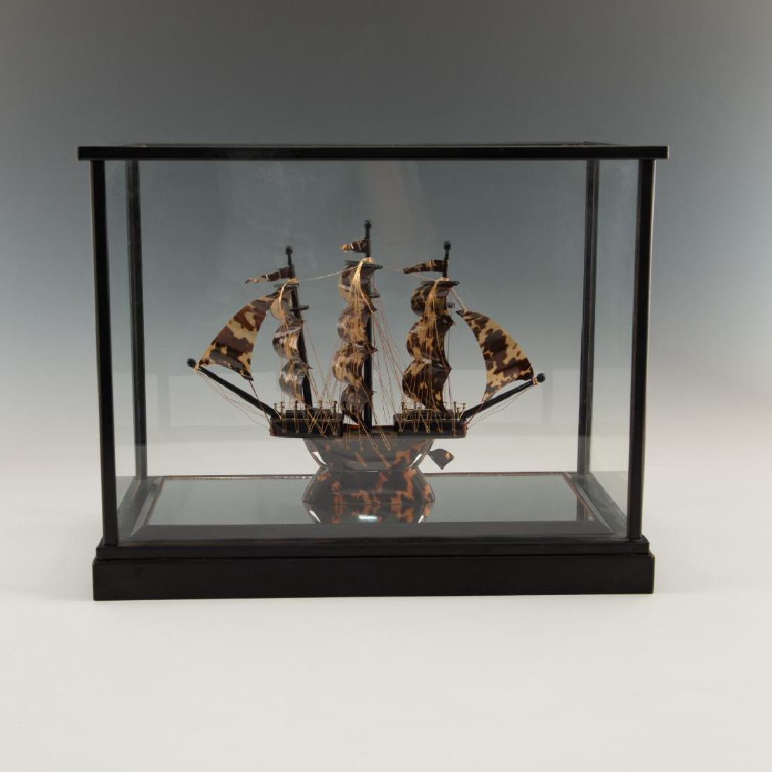 TORTOISESHELL MODEL SHIP IN GLASS SHOWCASE (1 of 5)