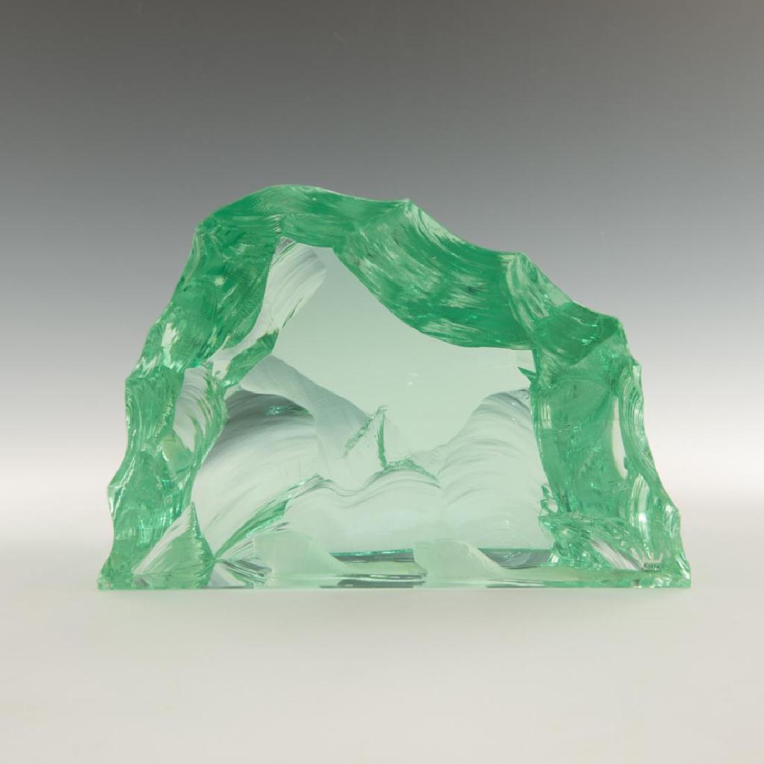 KOSTA BODA GLASS SWIMMING POLAR BEARS SCULPTURE: In a form of a chiseled transparent green, ice floe with 2 bears. Original sticker label on the front. Dimensions: 11"L x 7.5"H x 4.75"W Issued: Circa 1970s Country of Origin: Sweden Artist: Vicki Lin
