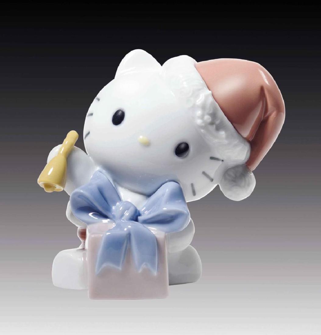 NAO LLADO HELLO KITTY PORCELAIN FIGURINE: Nao by Lladro charming porcelain figurine beautifully handcrafted in Valencia. The sweet as can be Hello Kitty Happy Holidays Figurine features Kitty in Santa cap with a present. Model number 1751. Di