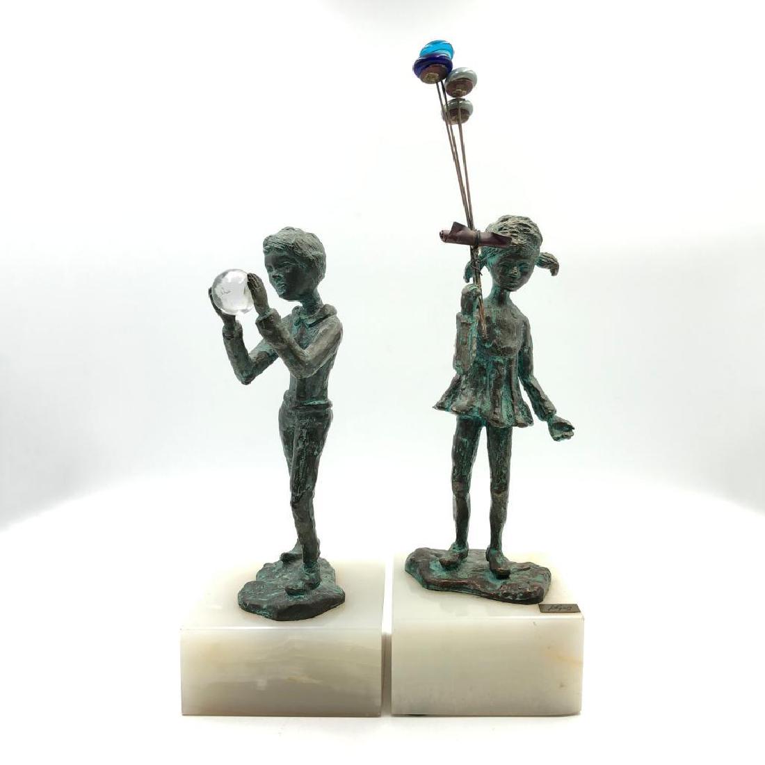 GROUP OF 2 BRONZE SCULPTURES BOY AND GIRL BY BIJAN: Brian Bijan bronze statues on marble depicting a boy and a girl. Signed on the base. Dimensions: Tallest 13.5" including base Issued: Circa 1960s