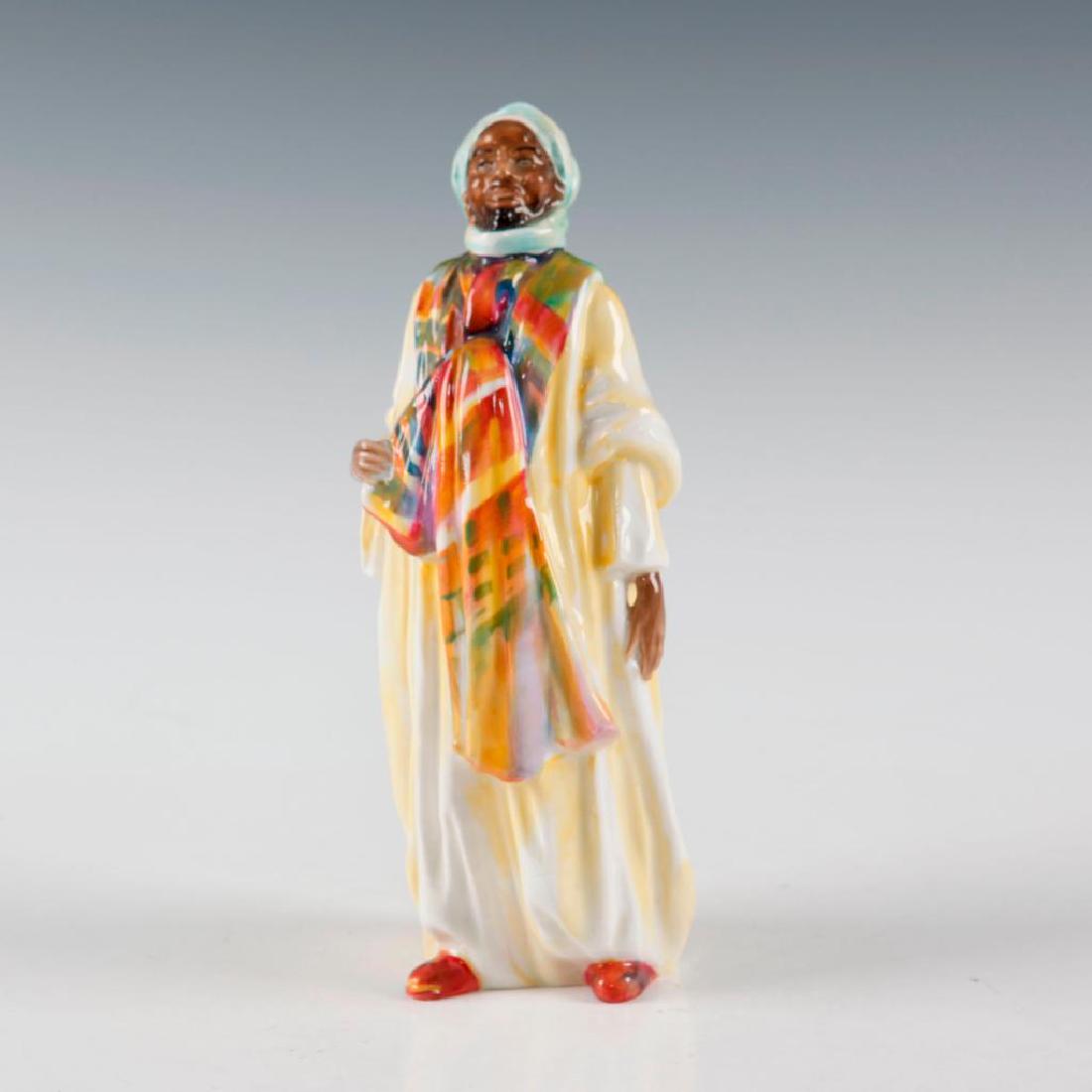 ROYAL DOULTON FIGURE OF THE EMIR HN1604: Good study of a man in middle eastern dress, early example. Issued: 1933 Dimensions: 7.5"H