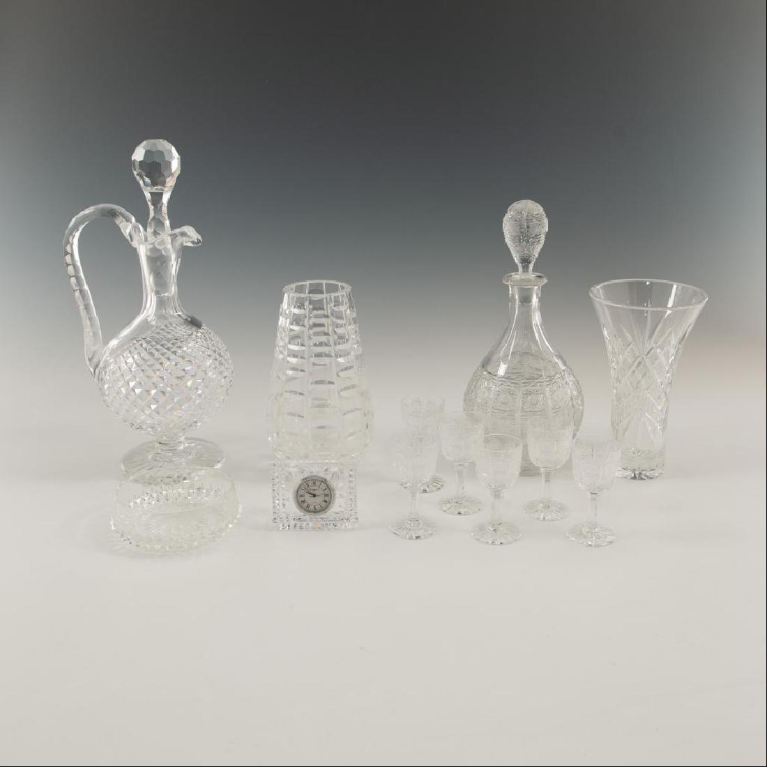 GROUP OF AMERICAN CUT GLASS TABLE PIECES: 12 items including decanters with tops, cordials and vases. Assorted drink and table ware. Dimensions: Tallest 12.5" H