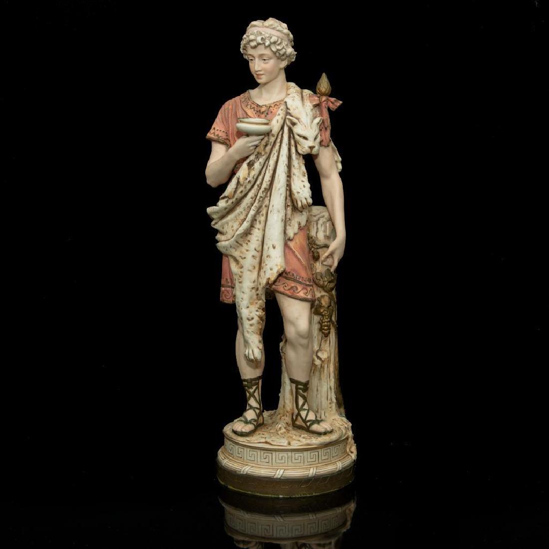 ROYAL DUX BOHEMIAN PORCELAIN MYTHOLOGICAL STATUE: Royal Dux Large Ceramic Figure of a Greek God. Issued: circa early 20th century Dimensions: 21"H x 6.5"D Country of Origin: Austria