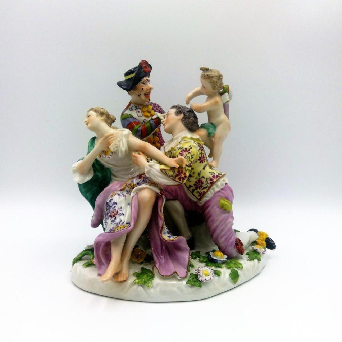 FRANKENTHAL PORCELAIN GROUP FIGURINE HARLEQUIN: Frankenthal Porcelain Group Figure depicting a scene from Italian Commedia Dell'Arte modelled by Johann Joachim Kaendler (1706 - 1775) for Meissen. Marked on the bottom. Issued: Circa 18th century. Di