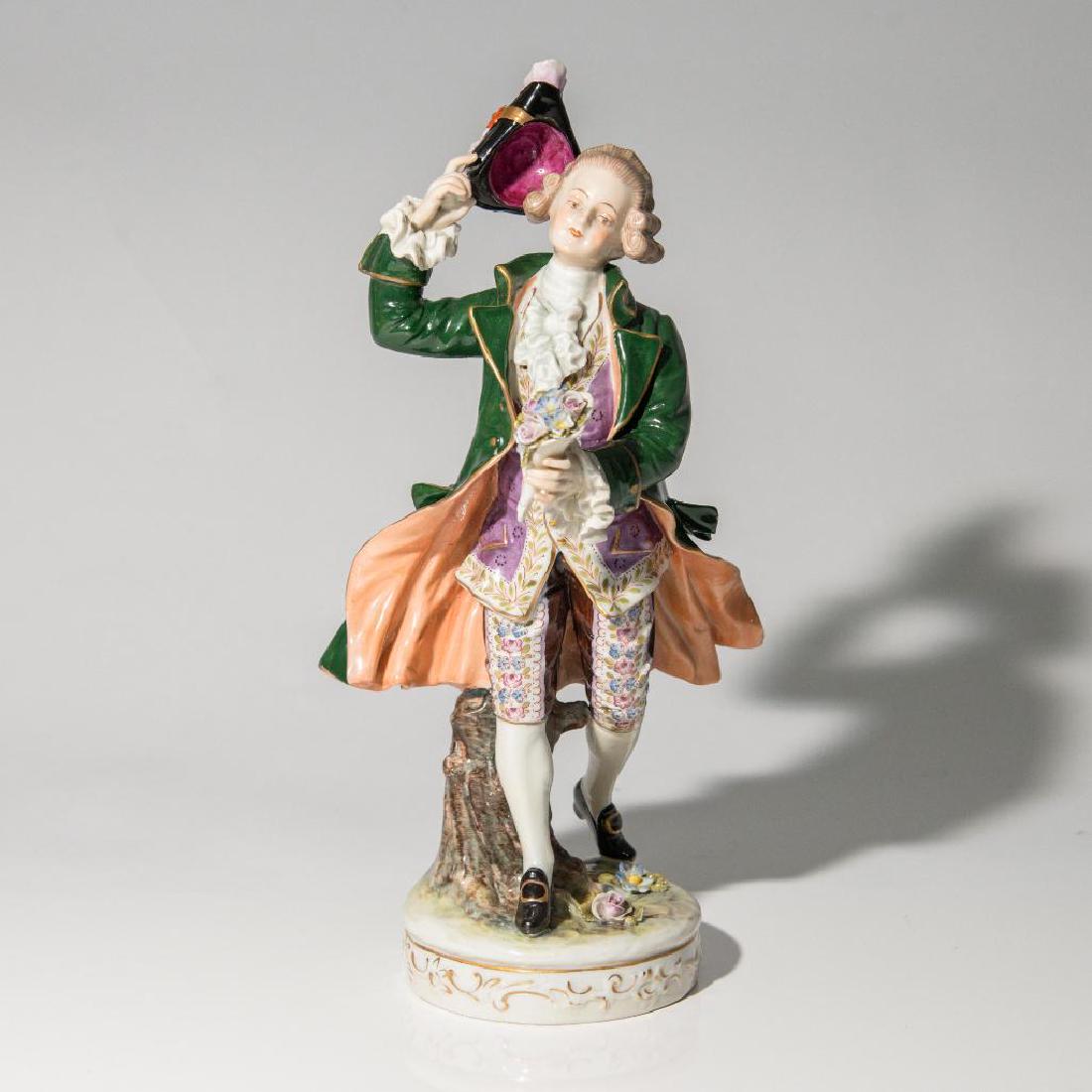LARGE ANTIQUE RUDOLSTADT GERMAN PORCELAIN FIGURE: Ernst Bohne Sohne Rudolstadt Figurine of a Gentleman with a Bouquet of Flowers. Issued: circa 1900s Dimensions: 12.5"H x 4.25"D on base Country of Origin: Germany
