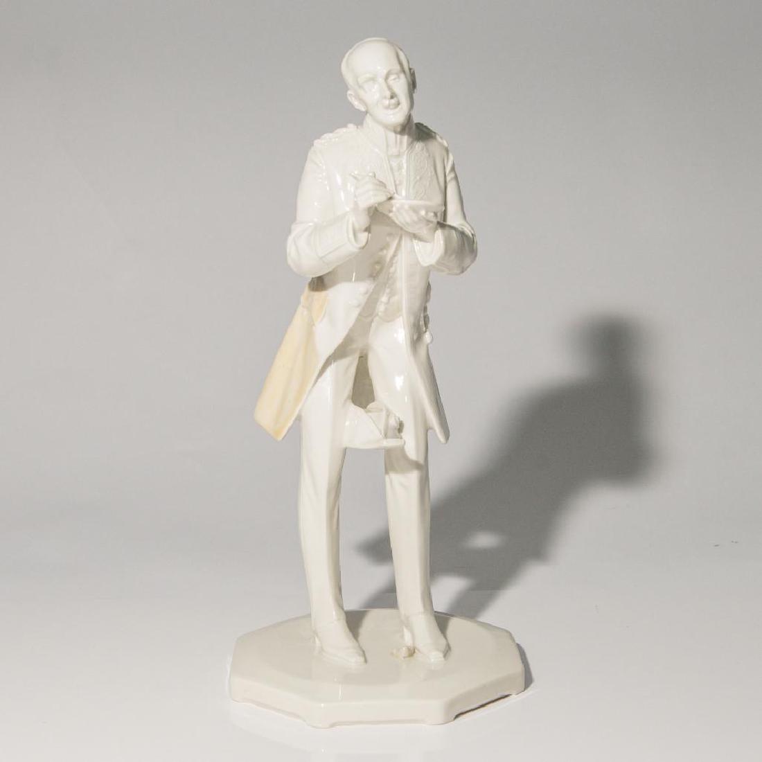 KPM LARGE GERMAN PORCELAIN FIGURINE GENTLEMAN: KPM Blanc de Chine Statue of a Gentleman with his hat between his knees and a plate and a fork in his hands. Signed by the artist and dated on the side of the base. Marked on the bottom. Model number