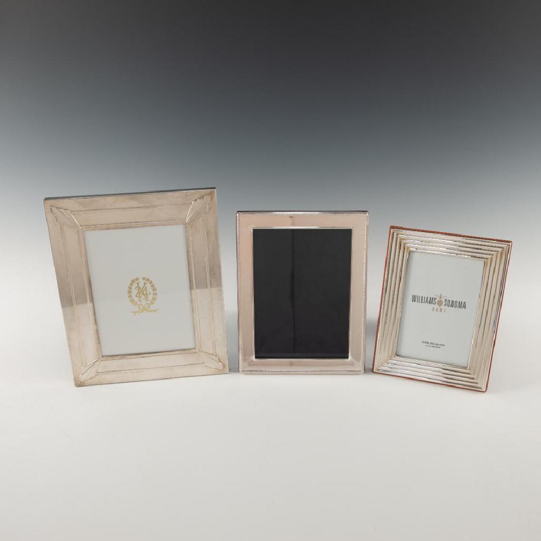 GROUP OF 3 STERLING SILVER PICTURE FRAMES LUNT WILLIAMS: Sterling frames by Lunt, Williams Sonoma and RC Carr. All are hallmarked on the edge. Art Deco Lunt Sterling is 10"H x 8"W, RC Carr is 8.75 Country of Origin: France, England
