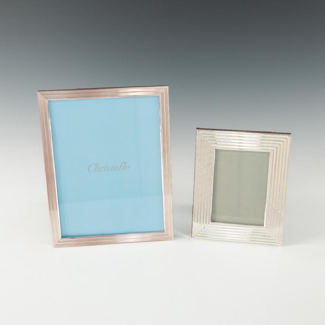 PAIR OF CHRISTOFLE PARIS SILVER PICTURE FRAMES: Set of two classical Christofle frames. Both signed. Dimensions: Largest one is 10.5"H x 8.25"W, smaller one is 7"H x 6"W Country of Origin: France