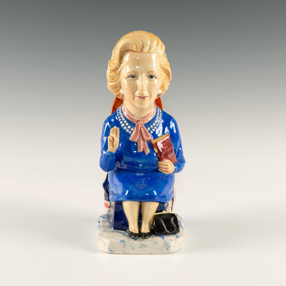 MARGARET THATCHER PM LIMITED EDITION CHARACTER TOBY JUG: The former British prime minister depicted on a stylized throne. Limited edition piece. Artist: Doug Tootle Issued: c. 1990 Dimensions: 9"H Edition Size: 1000 Edition Number: 60 Manufacturer: Kev