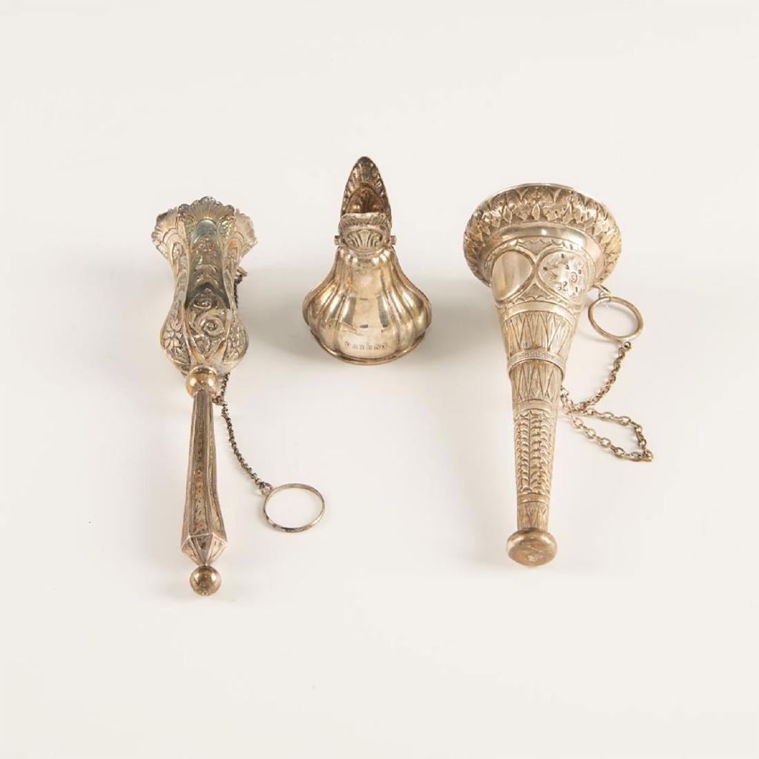 SET OF 2 SILVER PLATED AND CLAMP TUSSY MUSSIES: Finely decorated with flowers and motif posy holders. Two of the silver posy holders are beautifully engraved with floral designs and motifs and unmarked. Clamp is unmarked with scalloped body and eng