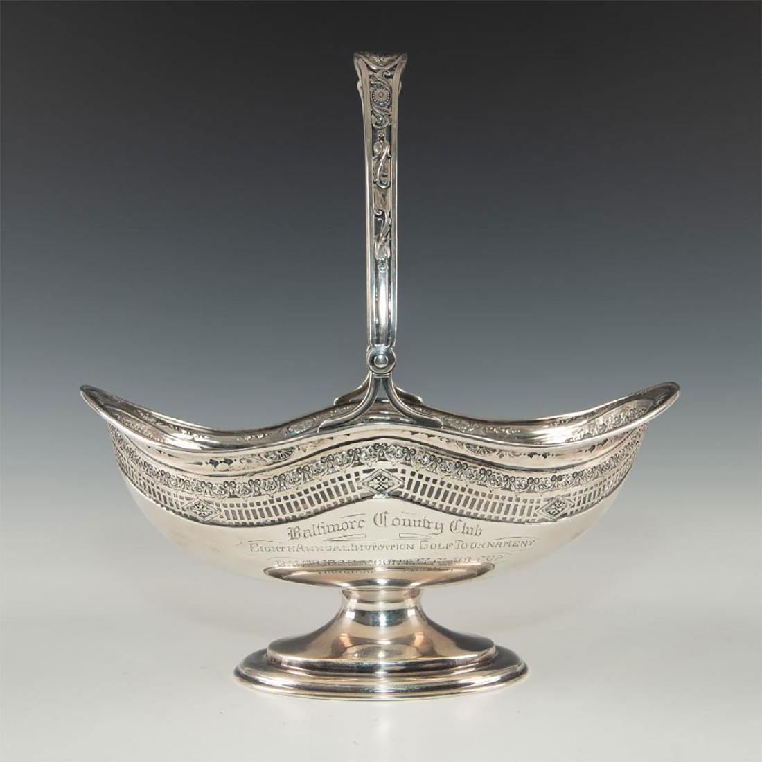 WATSON STERLING SILVER RETICULATED FRUIT BASKET: Detailed reticulated pierced design, footed base. STERLING marks. Approx. 14.15 Troy oz. An intricately designed reticulated Sterling silver fruit basket with footed base, created c. 1900 and awarded 